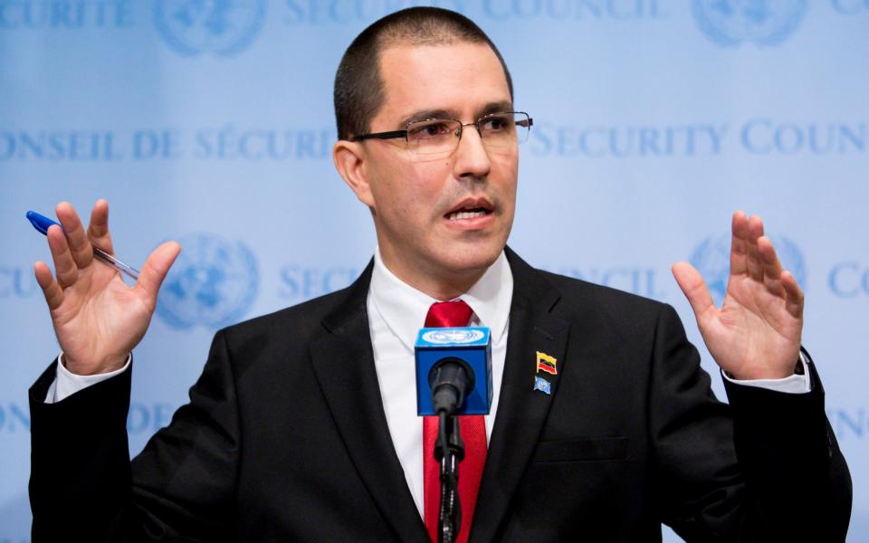 Jorge Arreaza, the Foreign Minister of Venezuela, talks with reporters - EPA