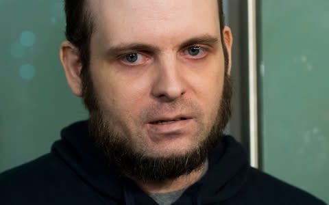 Joshua Boyle at Pearson Toronto International Airport revealed his wife had been raped and his daughter murdered by their captors - Credit: Nathan Denette/The Canadian Press via AP