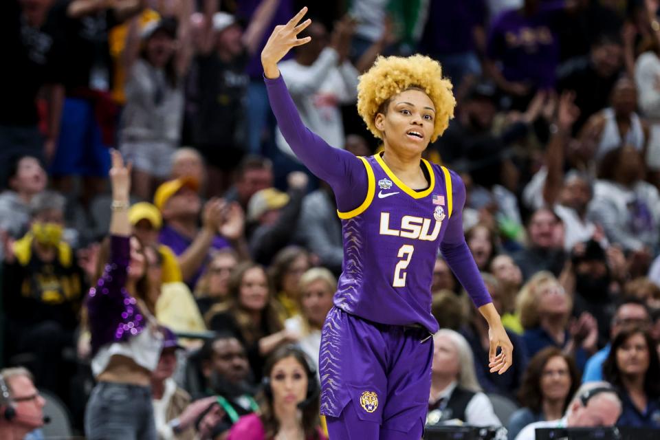LSU guard Jasmine Carson celebrates after making a three-point basket against Iowa during the NCAA women's basketball national championship game.