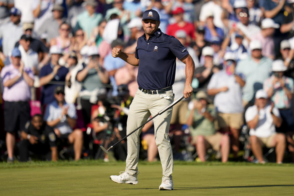 Bryson DeChambeau celebrates after a birdie on the 18th hole during the final round of the PGA Championship golf tournament at the Valhalla Golf Club, Sunday, May 19, 2024, in Louisville, Ky. (AP Photo/Jeff Roberson)