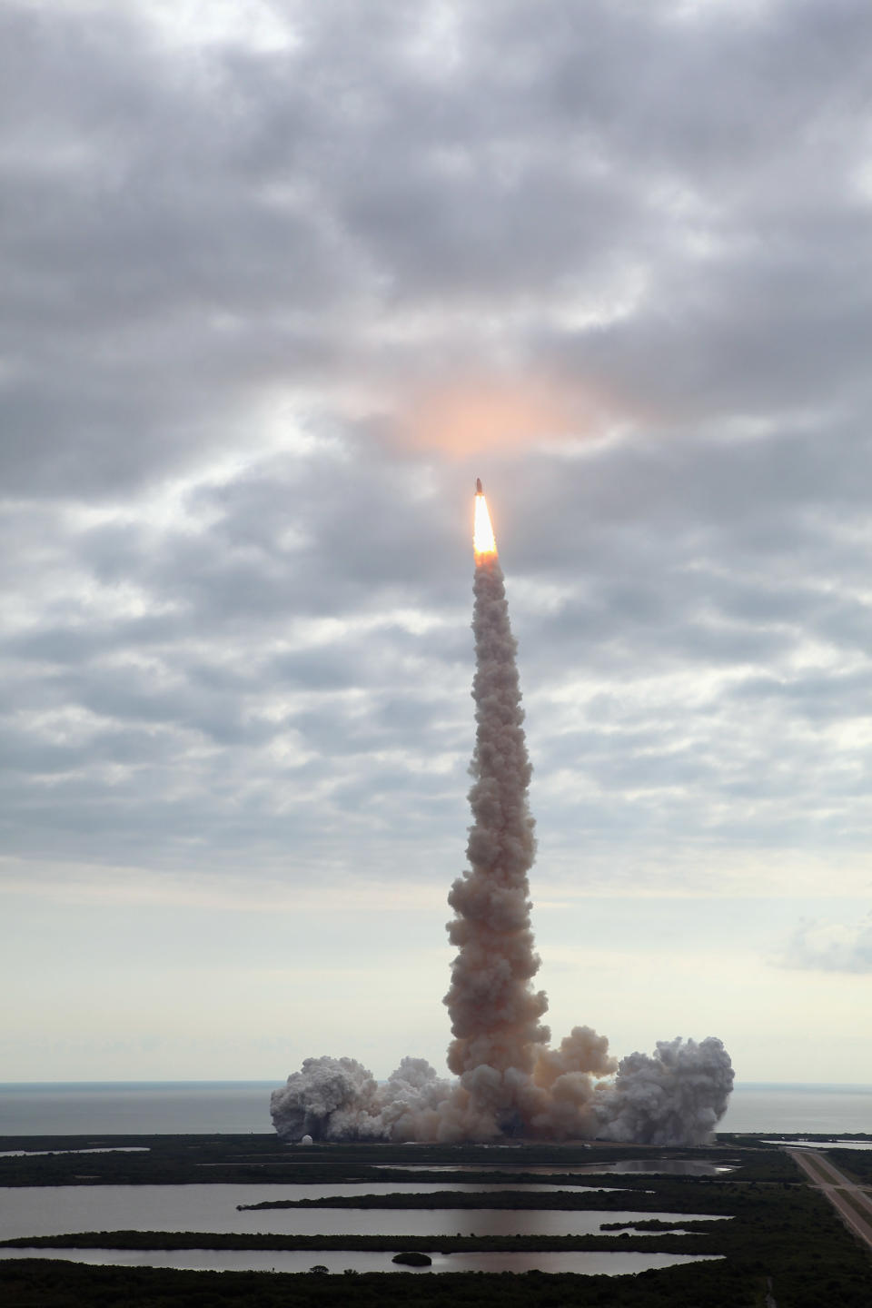 NASA space shuttle Endeavour lifts off from Launch Pad 39A at the Kennedy Space Center on May 16, 2011 in Cape Canaveral, Florida. After 20 years, 25 missions and more than 115 million miles in space, Endeavour is on its final flight to the International Space Station before being retired and donated to the California Science Center in Los Angeles. Capt. Mark E. Kelly, Gabrielle Giffords’s husband, will lead mission STS-134 as it delivers the Express Logistics Carrier-3 (ELC-3) and the Alpha Magnetic Spectrometer (AMS-2) to the International Space Station. (Photo by Joe Raedle/Getty Images)