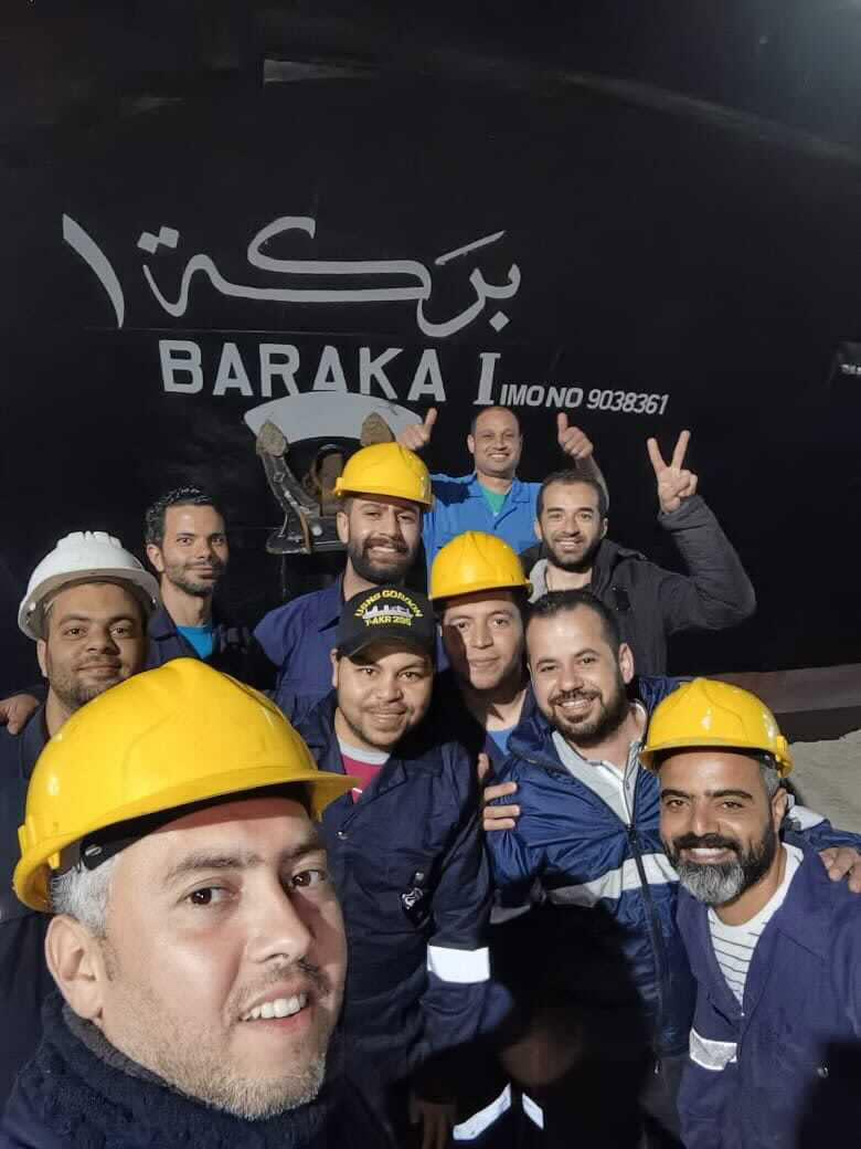 Image: Crew members of Baraka 1 tugboat (Mahmoud Shalabi)