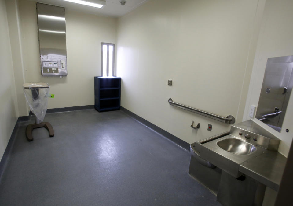 FILE - This Tuesday, June 25, 2013 file photo shows a secure patient treatment room in a housing unit at the California Correctional Health Care Facility in Stockton, Calif., during dedication day festivities. Legionnaires' disease bacteria that killed one inmate and sickened another is more widespread than expected in a California state prison, officials said Wednesday, April 17, 2019, citing new test results. Preliminary results found the bacteria in the water supply at a prison medical facility in Stockton and at two neighboring youth correctional facilities, said Corrections Department spokeswoman Vicky Waters. (AP Photo/Rich Pedroncelli, File)