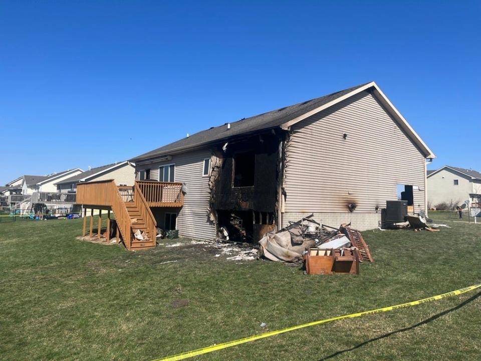 A charred home at 803 N.W. 32nd St. in Ankeny after a car struck it early Saturday and caught fire. The driver died in the burning wreckage, officials said.