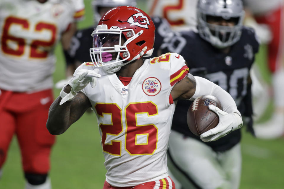 FILE - In this Nov. 22, 2020, file photo, Kansas City Chiefs running back Le'Veon Bell (26) carries the ball against the Las Vegas Raiders during the first half of an NFL football game in Las Vegas. Just a few years ago, Bell was arguably the best all-around running back in the league as a do-it-all playmaking force for Pittsburgh. Kansas City signed him and he wasn't much of a factor; he was active but didn't play in the Super Bowl. (AP Photo/Isaac Brekken, File)