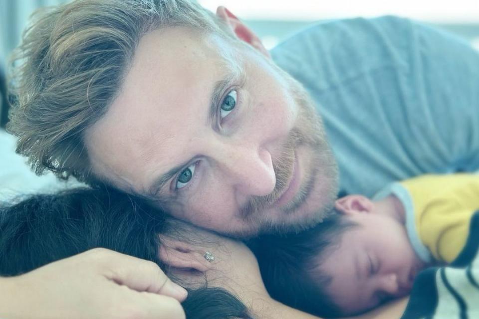 <p>david guetta/ Instagram</p> David Guetta poses with girlfriend Jessica Ledon and their newborn baby Cyan