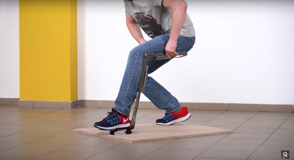 YouTuber and engineer, The Q, has made a metal brace that allows him to perform a "sitting in the air" trick.
