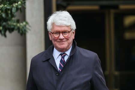 A former White House Counsel under President Barack Obama Greg Craig leaves the U.S. District Court in Washington, U.S., April 12, 2019. REUTERS/Jeenah Moon