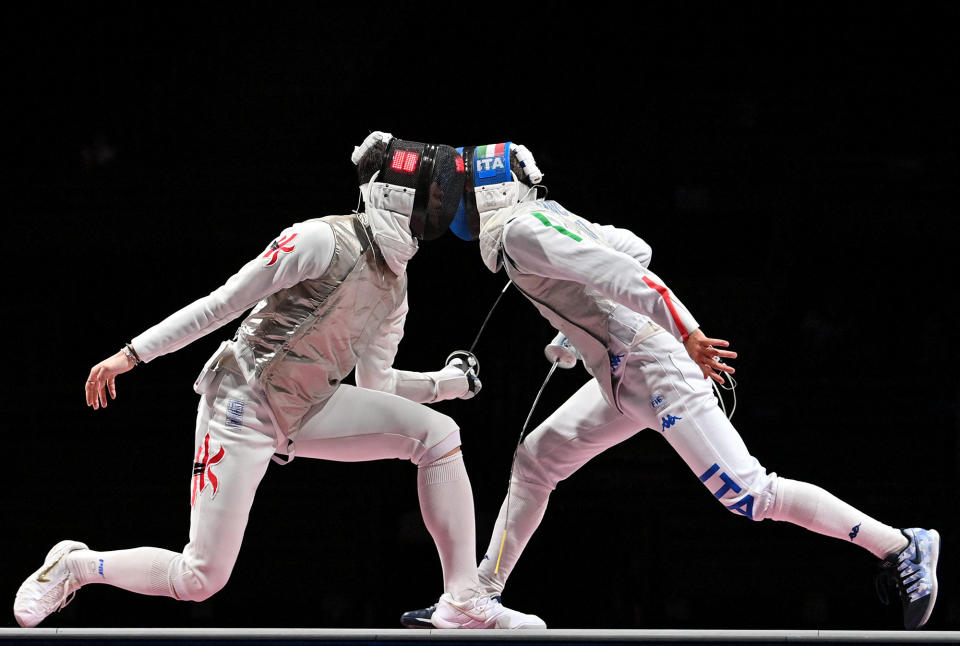 <p>Hong Kong's Cheung Ka Long (left) compete against Italy's Daniele Garozzo on July 26 in the men's individual foil fencing gold medal bout.</p>