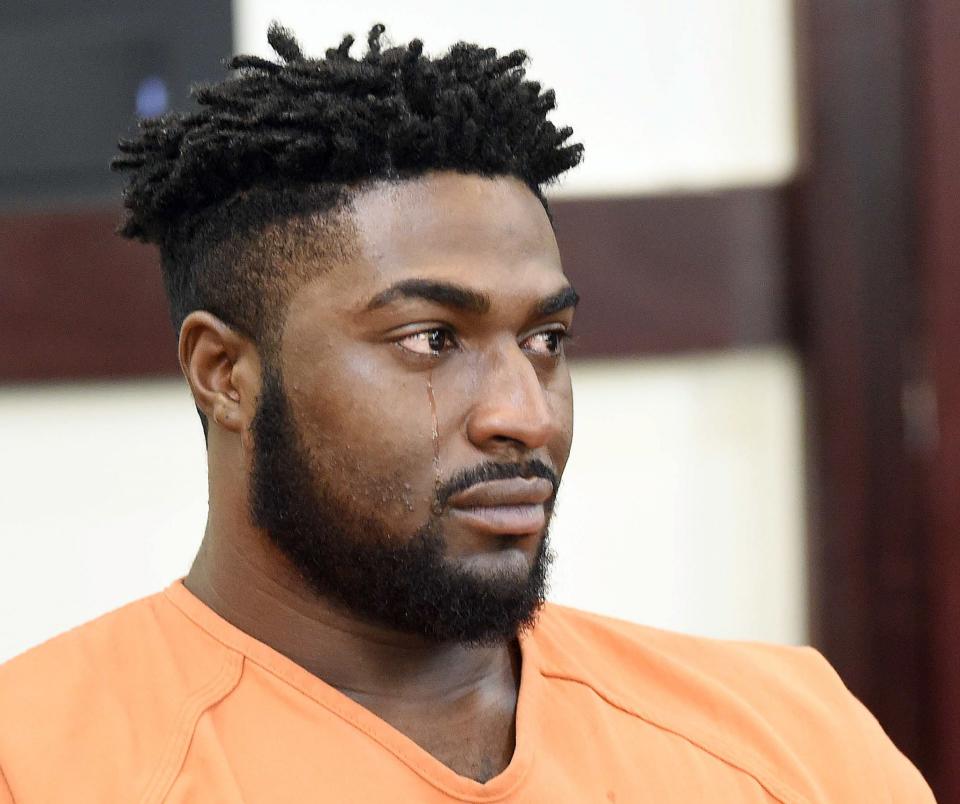 Cory Batey weeps during his sentencing hearing Friday, July 15, 2016, in Nashville, Tenn. Batey, a former Vanderbilt University football player, was sentenced to 15 years for raping an unconscious woman with his some of his teammates in 2013. (Samuel M. Simpkins/The Tennessean via AP, Pool)