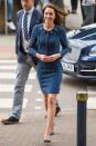 <p>In a navy tweed skirt suit and pointed toe pumps while visiting London terror attack victims at Kings College Hospital.</p>