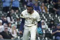 Milwaukee Brewers pitcher Abner Uribe reacts after getting San Diego Padres' Fernando Tatis Jr. out during the eighth inning of a baseball game Wednesday, April 17, 2024, in Milwaukee. (AP Photo/Morry Gash)