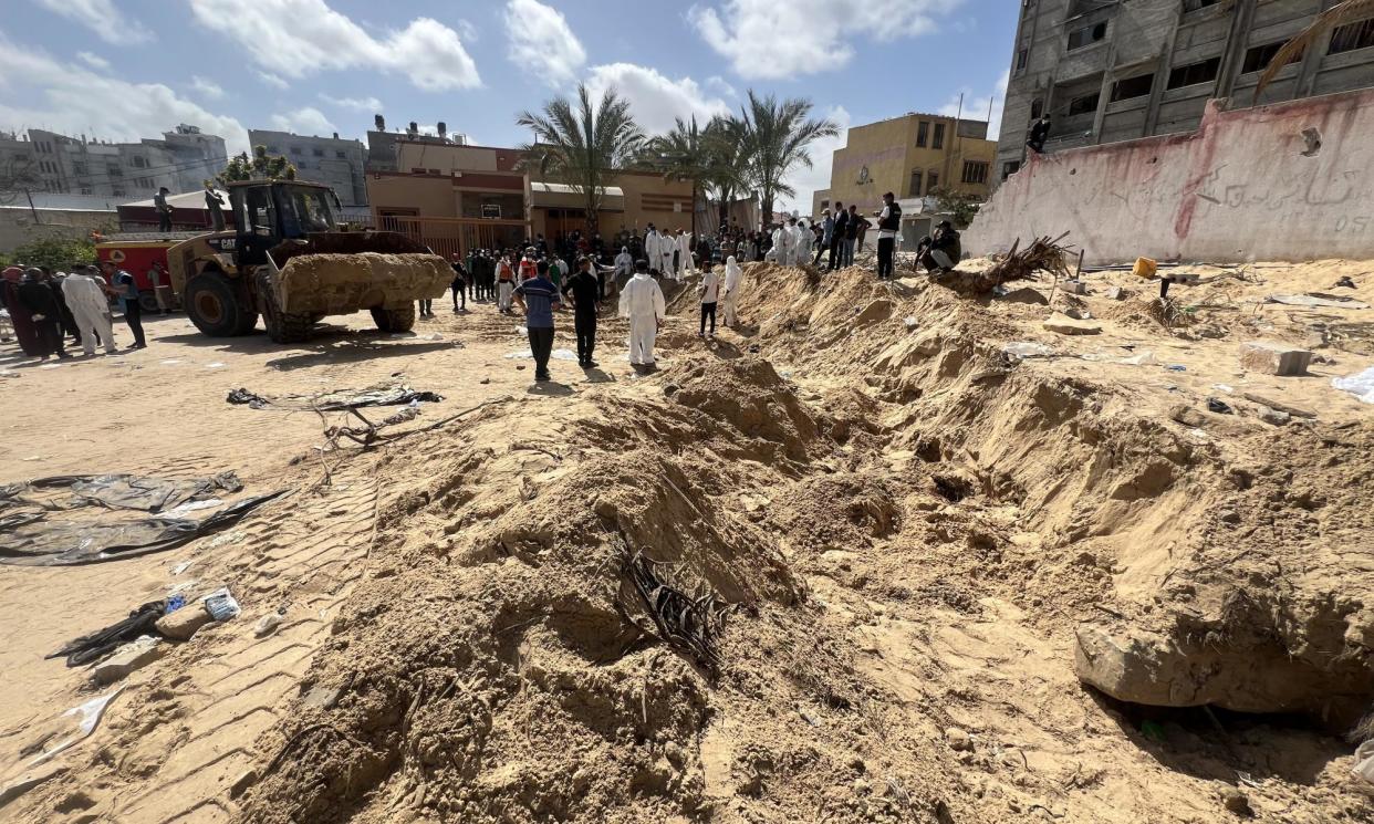 <span>Civil defence teams on 21 April uncover bodies buried in a mass grave at Nasser hospital in Khan Younis, after Israeli troops withdrew.</span><span>Photograph: Anas Zeyad Fteha/Anadolu/Getty Images</span>