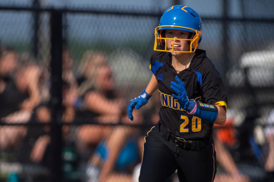 Castle's Emma Boyer (20) runs home as the Castle Knights play the Central Bears during the 2023 IHSAA 4A softball sectional at North high School Tuesday, May 23, 2023.