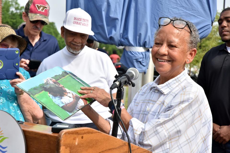 World-acclaimed author and poet Nikki Giovanni reads her poetry book, "Knoxville, Tennessee" to a large crowd outside of the Cal Johnson Recreation Center on Hall of Fame Drive. Giovanni was honored at a celebration on Thursday, May 23, 2019.