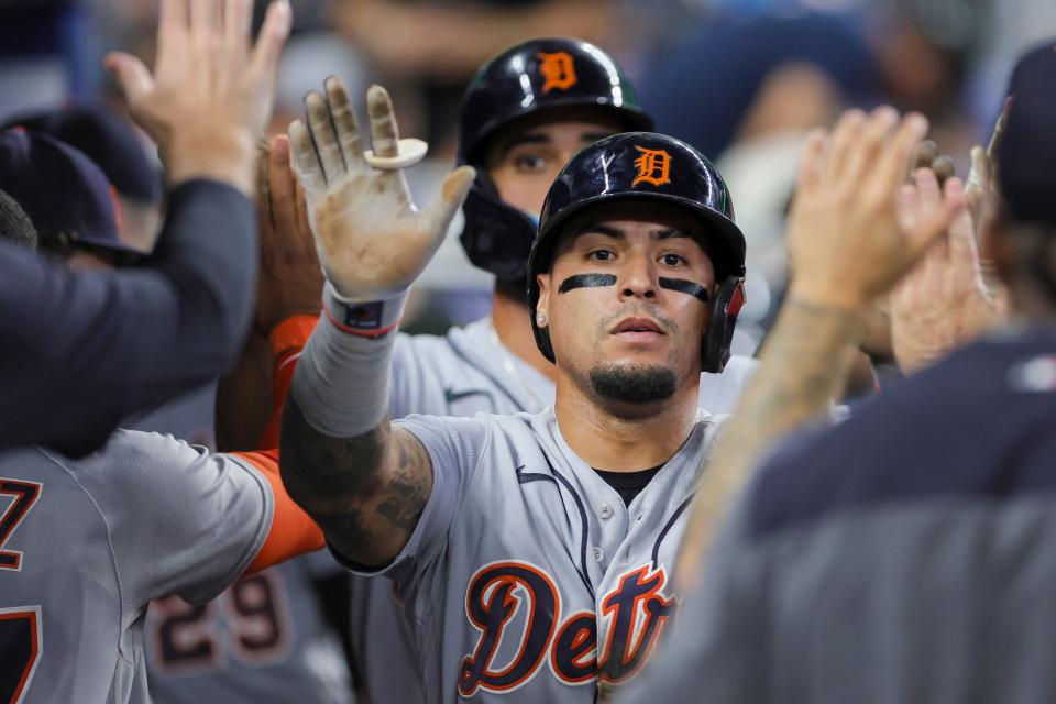 Detroit Tigers shortstop Javier Baez (28) celebrates with teammates after scoring against the Miami Marlins during the third inning at loanDepot Park in Miami on Sunday, July 30, 2023.