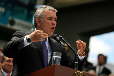 FILE PHOTO: Colombian President, Ivan Duque, speaks during a promotion ceremony at a military school in Bogota, Colombia December 17, 2018. REUTERS/Luisa Gonzalez/File Photo