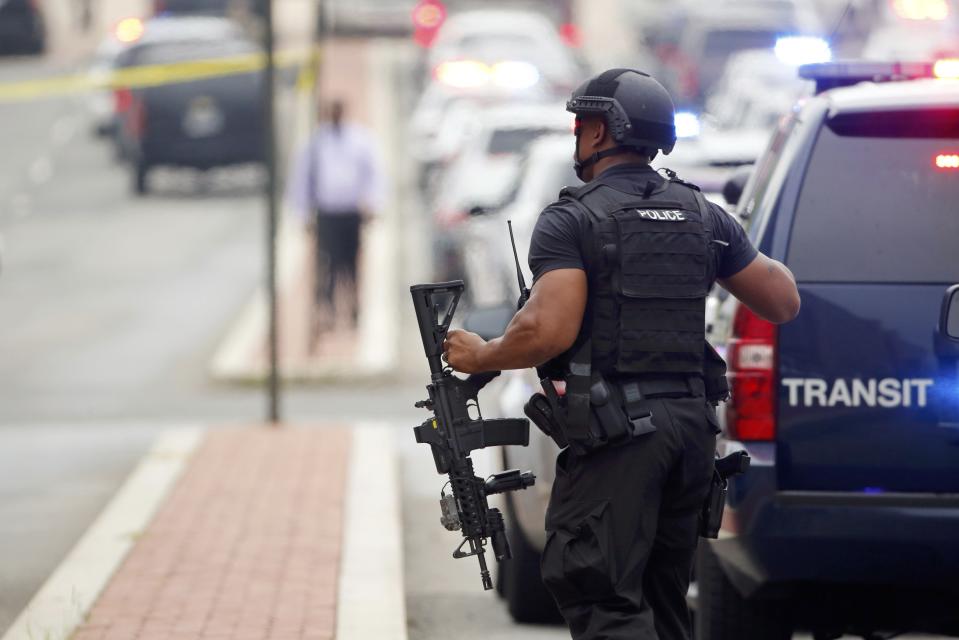 Police respond to reports of a shooting and subsequent lockdown at the U.S. Navy Yard in Washington