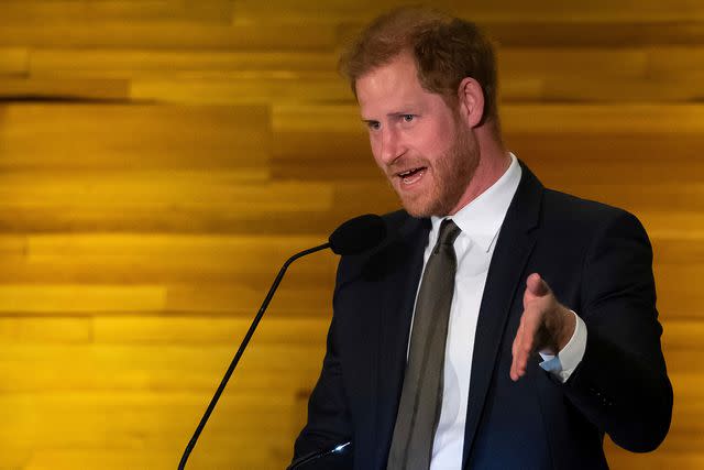 <p>Ethan Cairns/The Canadian Press via AP</p> Prince Harry speaks during the "One Year to Go" Invictus Games dinner in Vancouver, British Columbia, Friday, Feb. 16, 2024.