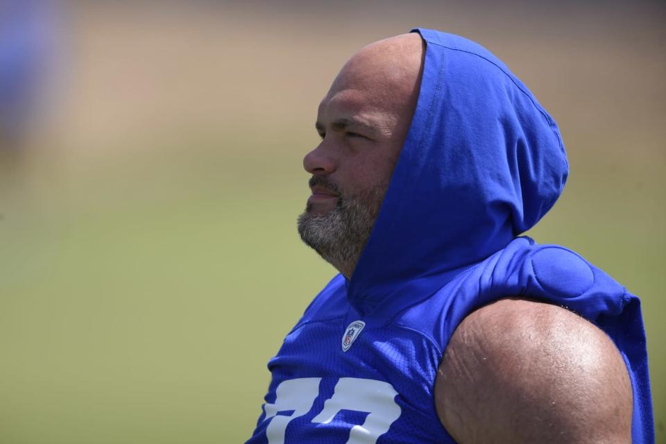 Rams&#39; left tackle Andrew Whitworth warms up before a practice in Thousand Oaks.