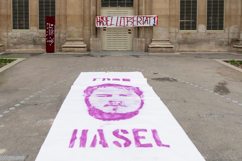 A poster with the image of Catalan rap singer Pablo Hasel is seen in front of the rectory of the University of Lleida