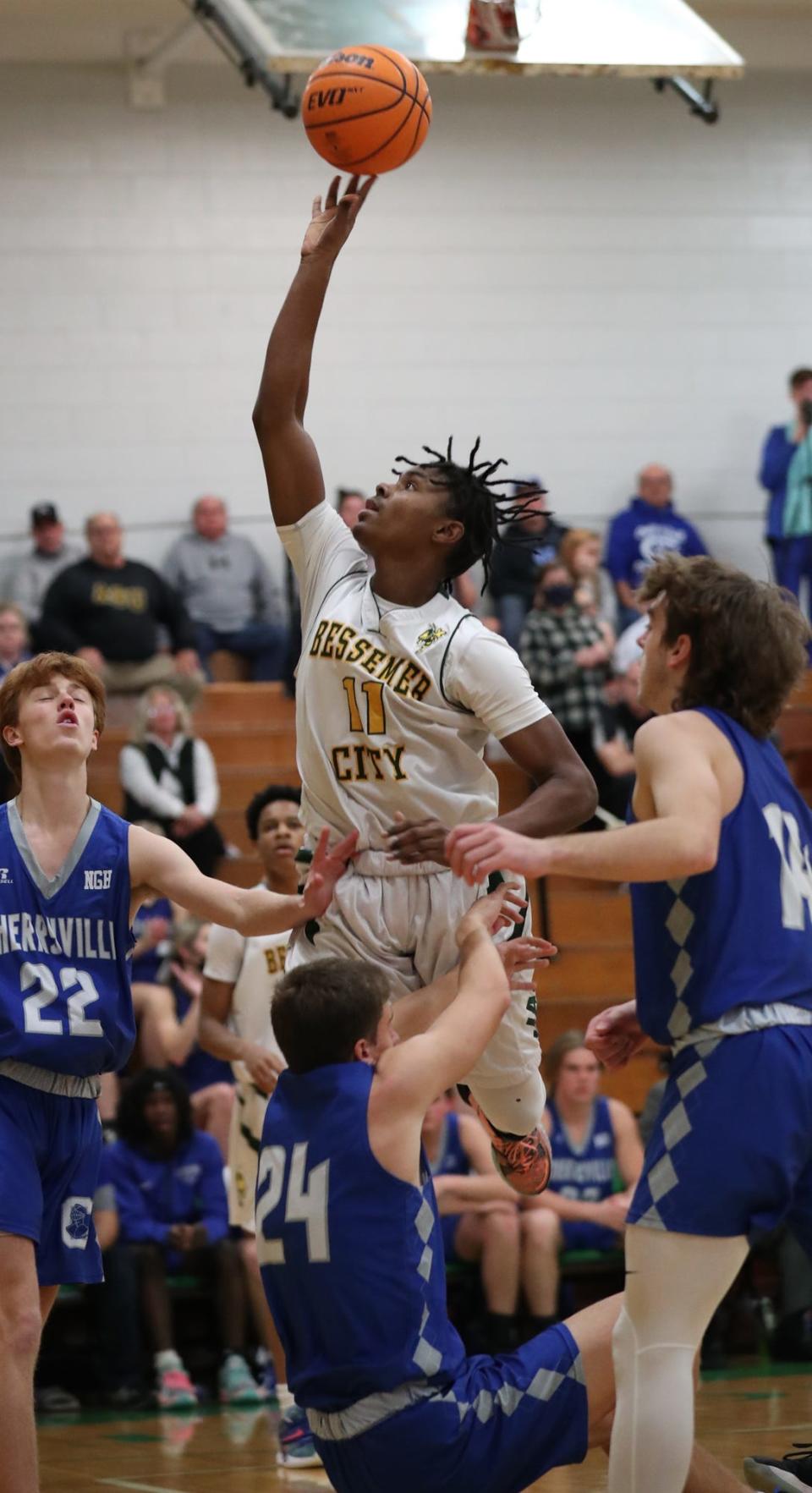 Bessemer City's Randall Pettus puts up a shot against Cherryville Friday night. (Brian Mayhew / Special to the Gazette)