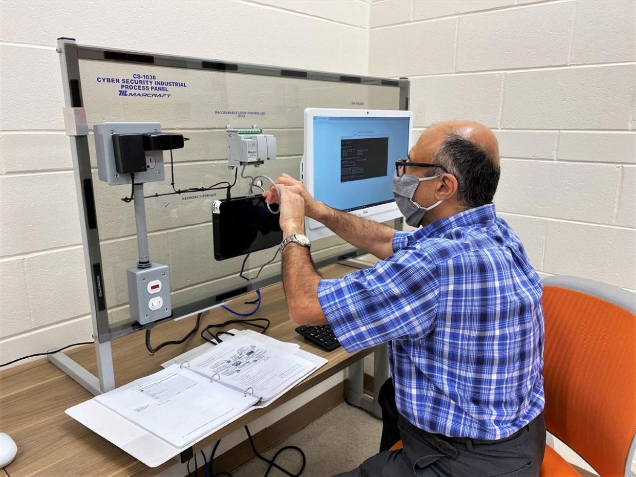 Professor George Meghabghab, head of Roane State’s computer science department, will develop training for businesses to learn how to protect digital manufacturing equipment.