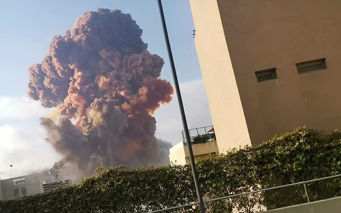 The orange-brown colour of the cloud after the Beirut blast is typical of an ammonium nitrate explosion, say experts  - Karim Sokhn/via Reuters 