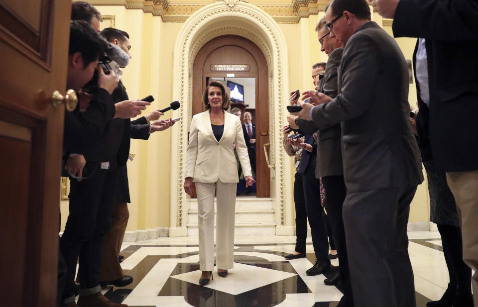 House Minority Leader Nancy Pelosi approaches a group of reporters after speaking for more than 8 hours. (Photo: Pablo Martinez Monsivais/AP)