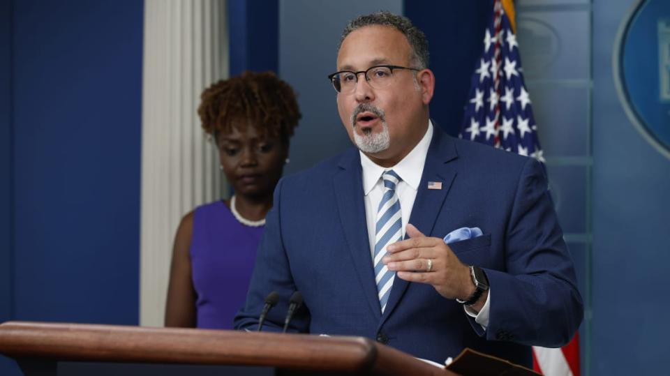 White House Press Secretary Karine Jean-Pierre (L) and Education Secretary Miguel Cardona talk to reporters during the daily news conference in the Brady Press Briefing Room at the White House on June 30, 2023 in Washington, DC. (Photo by Chip Somodevilla/Getty Images)