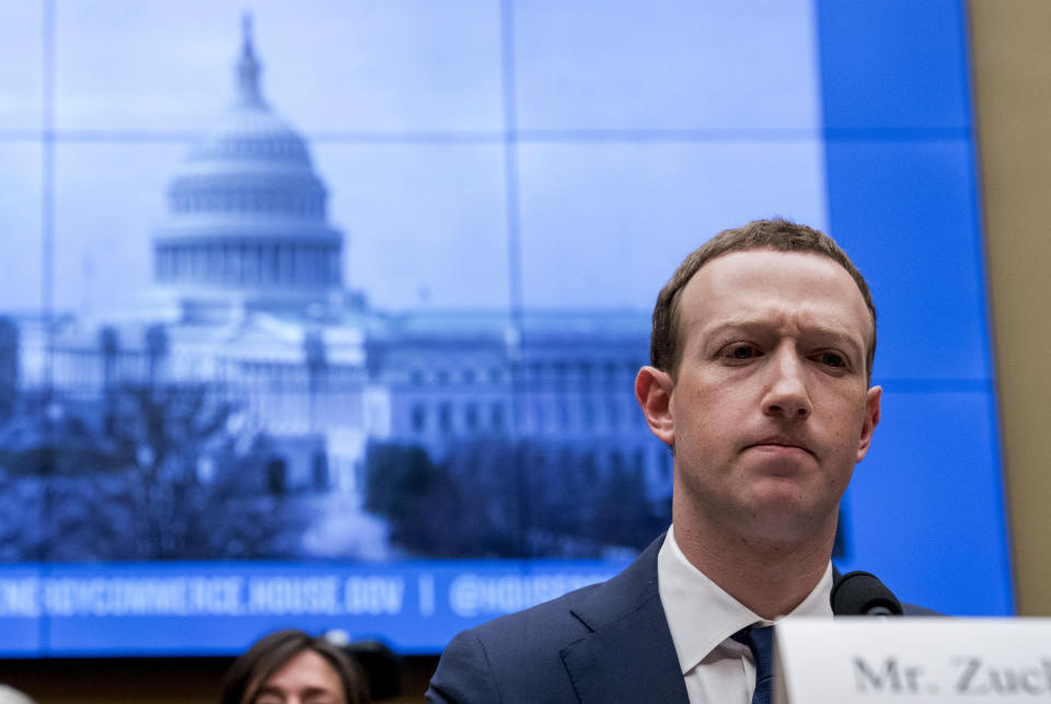 FILE - In this April 11, 2018, file photo, Facebook CEO Mark Zuckerberg pauses while testifying before a House Energy and Commerce hearing on Capitol Hill in Washington about the use of Facebook data to target American voters in the 2016 election and data privacy. A year ago, Shoshana Zuboff dropped an intellectual bomb on the technology industry. In a 700-page book, the Harvard scholar skewered tech giants like Facebook and Google with a damning phrase: “surveillance capitalism.” (AP Photo/Andrew Harnik, File)