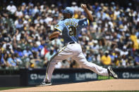 Milwaukee Brewers' Jose Berrios strikes out Toronto Blue Jays' Bo Bichette during the first inning of a baseball game Sunday, June 26, 2022, in Milwaukee. (AP Photo/Kenny Yoo)