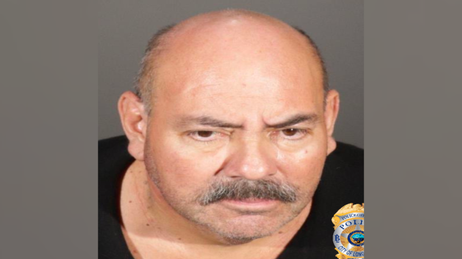 Martin Lopez, 55, was arrested on allegations that he posed as a police officer and sexually assaulted a woman under the guise of a police search. (Los Angeles County District Attorney's Office)