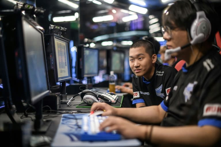 Members of professional eSports team 'Afreeca Freaks' prepare to compete in a 'League of Legends' competition, in Seoul, on July 11, 2018