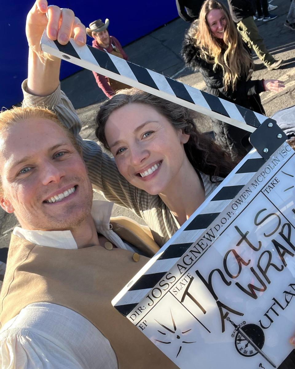 Sam Heughan and Caitriona Balfe celebrating filming for "Outlander" season seven being over.