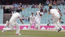 West Indies batsman Darren Bravo (C) hits past Australian bowler James Pattinson during their third cricket test at the SCG in Sydney, January 3, 2016. REUTERS/Jason Reed