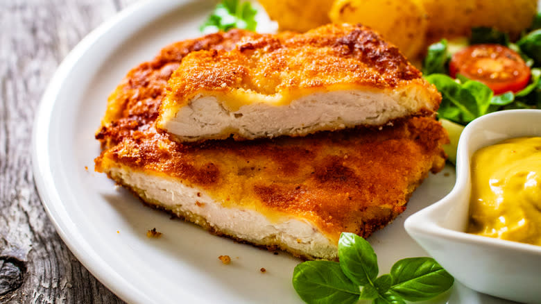 Fried chicken cutlet on plate