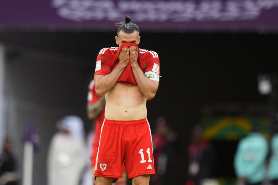 Wales' Gareth Bale reacts after their loss in the World Cup group B soccer match between Wales and Iran, at the Ahmad Bin Ali Stadium in Al Rayyan , Qatar, Friday, Nov. 25, 2022. (AP Photo/Alessandra Tarantino)