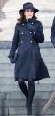 <p>The Duchess wore a CH Carolina Herrera double-breasted coat, LK Bennett clutch, tights, navy pumps, bow-detailed gloves, and a suede hat at a memorial for victims of the Grenfell Tower fire.</p>