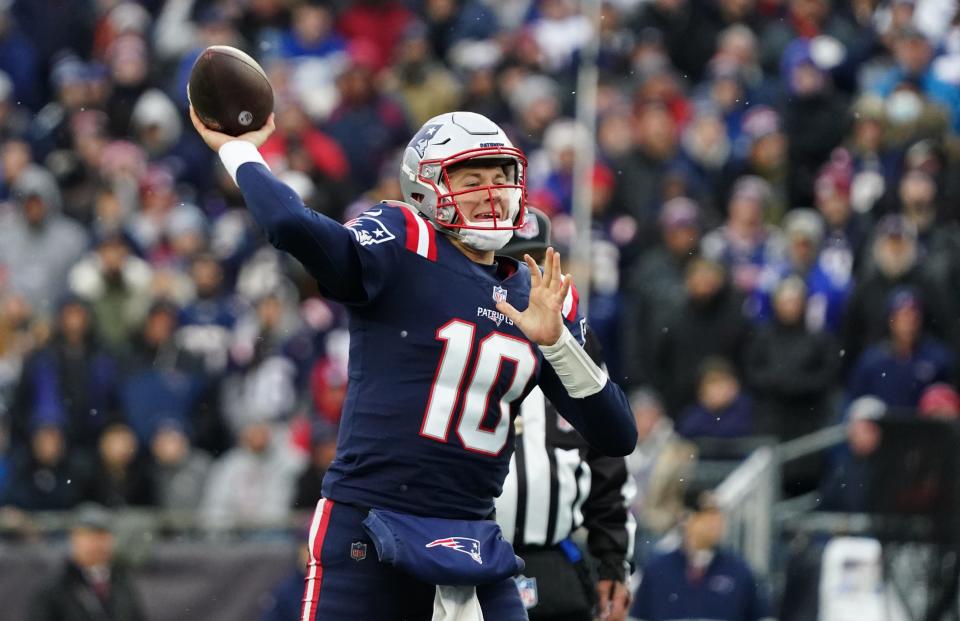 Patriots quarterback Mac Jones throws a pass against the Tennessee Titans during the second quarter Sunday at Gillette Stadium.