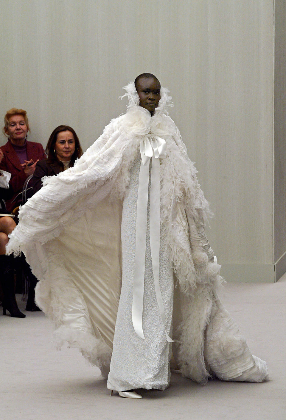 Sudanese model Alek Wek wears a creation by Lagerfeld for Chanel as part of the spring/summer 2004 couture show in Paris, Jan. 20, 2004.