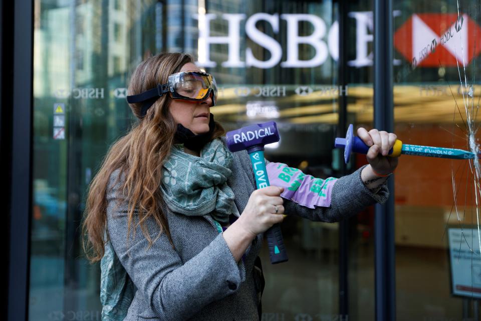 <p>Activists smashed the windows of HSBC’s headquarters</p> (REUTERS)