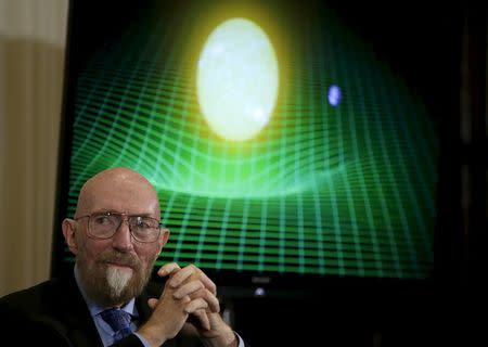 Dr. Kip Thorne of Caltech (R) listens during a news conference to discuss the detection of gravitational waves, ripples in space and time hypothesized by physicist Albert Einstein a century ago, in Washington February 11, 2016. REUTERS/Gary Cameron