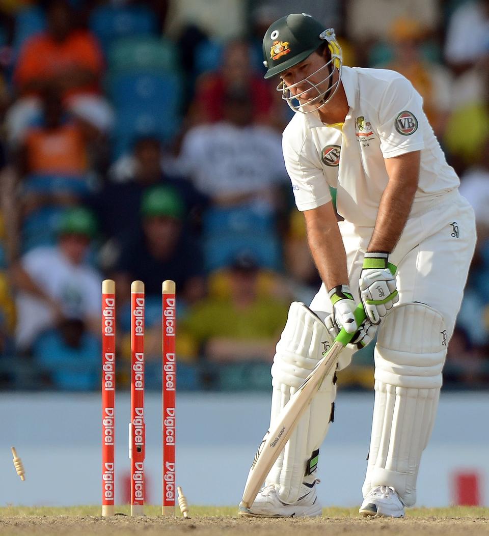 Australian cricketer Ricky Ponting is clean bowled off West Indies bowler Narsingh Deonarine during the final day of the first-of-three Test matches between Australia and West Indies at the Kensington Oval stadium in Bridgetown on April 11, 2012. Australia is chasing a target of 192 runs to win the match. AFP PHOTO/Jewel Samad (Photo credit should read JEWEL SAMAD/AFP/Getty Images)