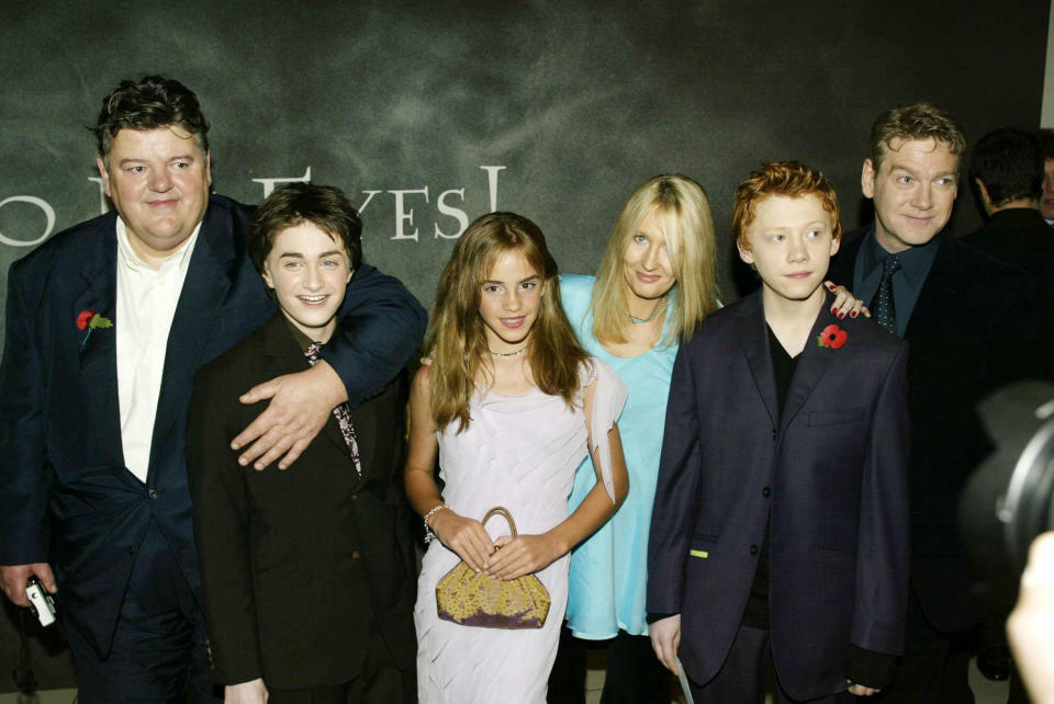 LONDON - NOVEMBER 3: Actors Robbie Coltrane, Daniel Radcliffe, Emma Watson, Author Jk Rowling, Rupert Grint and Kenneth Branagh arrive for the world premiere of 