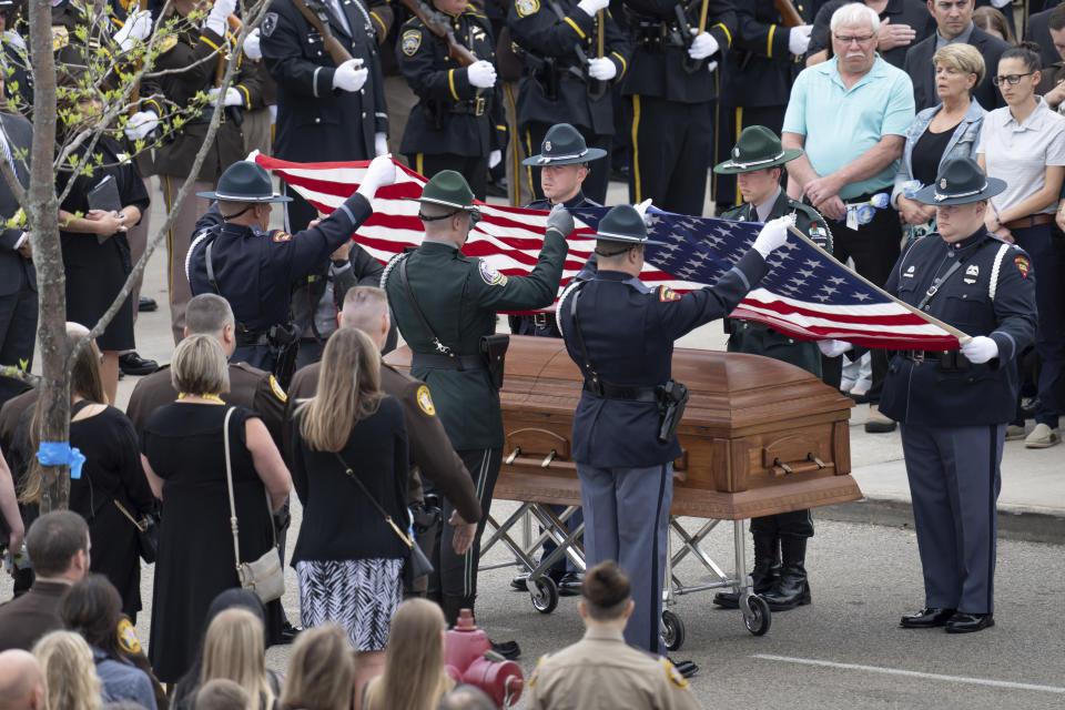 Over a thousand law enforcement officers from around the U.S. gathered for the funeral service for St. Croix County Sheriff’s Deputy Kaitlin “Kaitie” R. Leising, Friday, May 12, 2023 in Hudson, Wis.. Hundreds of law enforcement officers from several states joined other mourners in paying final respects Friday to a Wisconsin sheriff’s deputy who was fatally shot by a suspected drunken driver during a traffic stop. (Glen Stubbe/Star Tribune via AP)