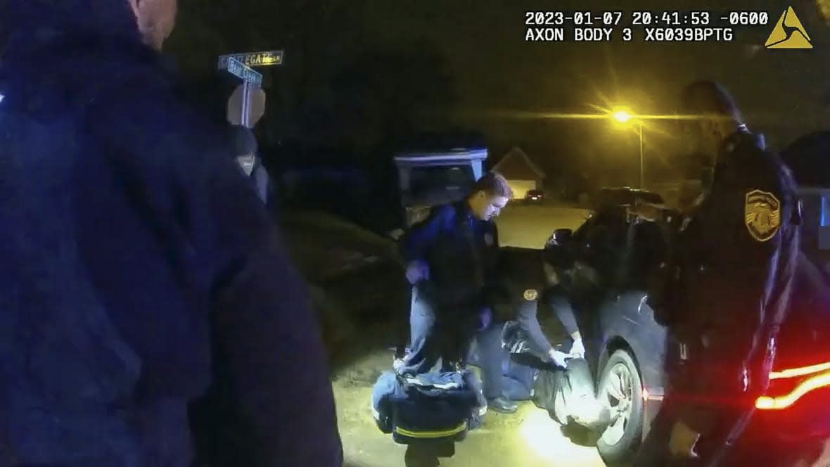 The image from video released on Jan. 27, 2023, by the City of Memphis, shows Tyre Nichols on the ground as medics arrive during a brutal attack by five Memphis police officers on Jan. 7, 2023, in Memphis, Tenn. (City of Memphis via AP)