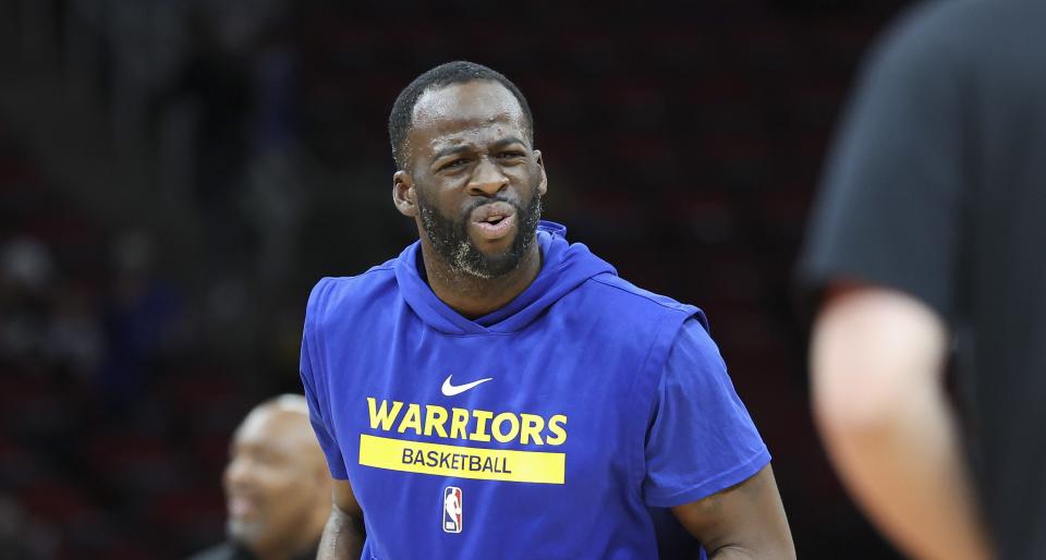 Mar 20, 2023; Houston, Texas, USA; Golden State Warriors forward Draymond Green (23) reacts during practice before the game against the Houston Rockets at Toyota Center. Mandatory Credit: Troy Taormina-USA TODAY Sports