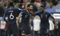 <p>Samuel Umtiti, Adil Rami, Paul Pogba celebrate after beating Belgium 1-0 </p>