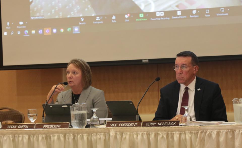 Becky Guffin, president, and Terry Nebelsick, vice president of the South Dakota Board of Education Standards listen to Monday's testimony in Aberdeen.